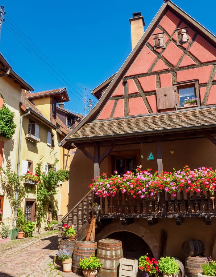 street-with-colorful-traditional-french-houses-in-eguisheim-france